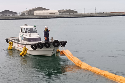 Oil spill prevention measures by deploying oil fences(Ishinomaki Plant) 