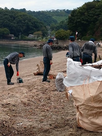 Taking part in a cleanup activity hosted by the local fisheries cooperative (Tanoura Plant)